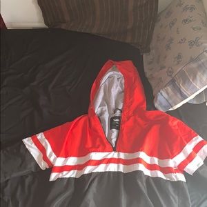 Black, white, and red wind breaker